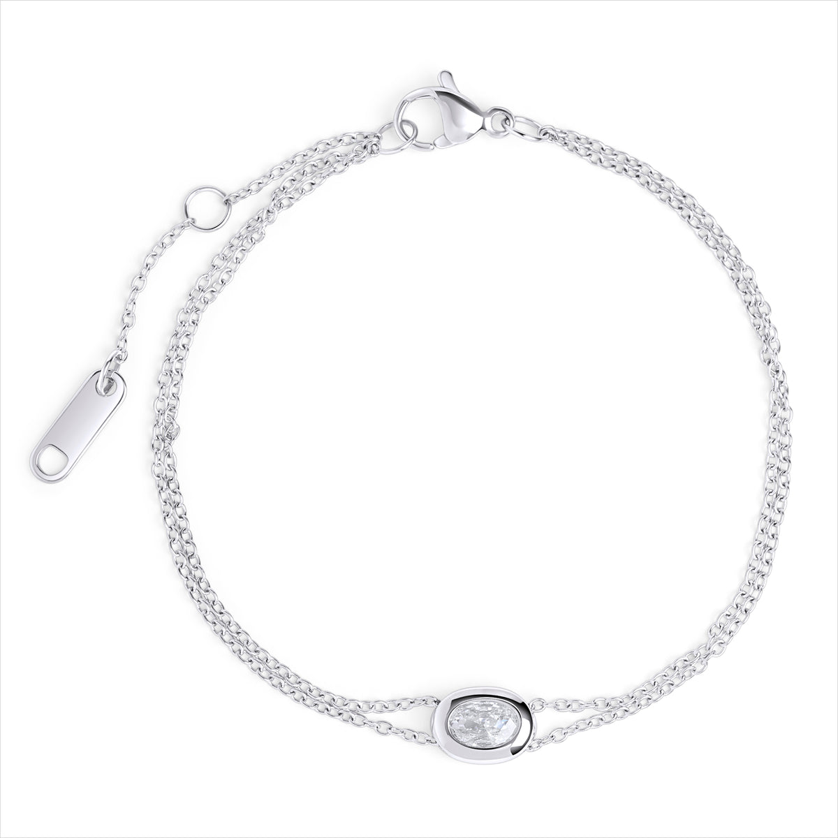 A double silver chain bracelet with an oval clear stone centerpiece, shown on a clean white background. Waterproof, stainless steel and allergy free. By Mia Bijoux Canada.

Bracelet à double chaîne argentée orné d'une pierre transparente ovale en son centre, présenté sur fond blanc épuré. Résistant à l'eau, en acier inoxydable et hypoallergénique. Par Mia Bijoux Canada.